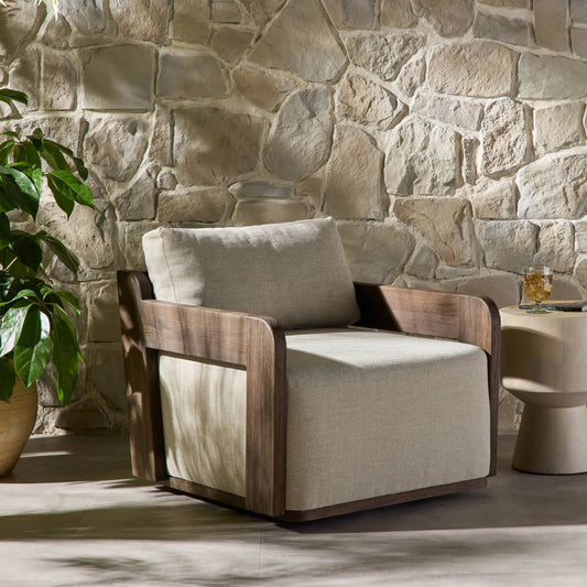 Arwen Outdoor Swivel Chair by Four Hands in alessi buff, stained saddle brown-fsc. Made from 100% polypropylene, solid fsc®-certified teak in a unique style.