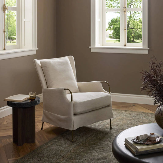 Jenaya Chair by Four Hands in bergamo parchment, brushed brass, palermo drift. Made from 75% cotton, 25% flax, linen, iron, top grain leather in a unique style.