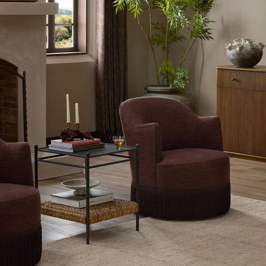 Aurora Fringe Swivel Chair by Four Hands in laughlin plum, distressed natural, plum fringe. Made from 97% polyester, 3% flax, linen, solid parawood, 70% polyester, 30% cotton in a unique style.