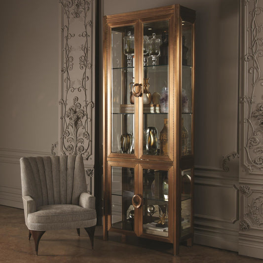 Apothecary Vitrine by Global Views in dark brass. Made from poplar, beveled clear glass in a transitional style.