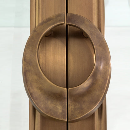 Apothecary Vitrine by Global Views in dark brass. Made from poplar, beveled clear glass in a transitional style.