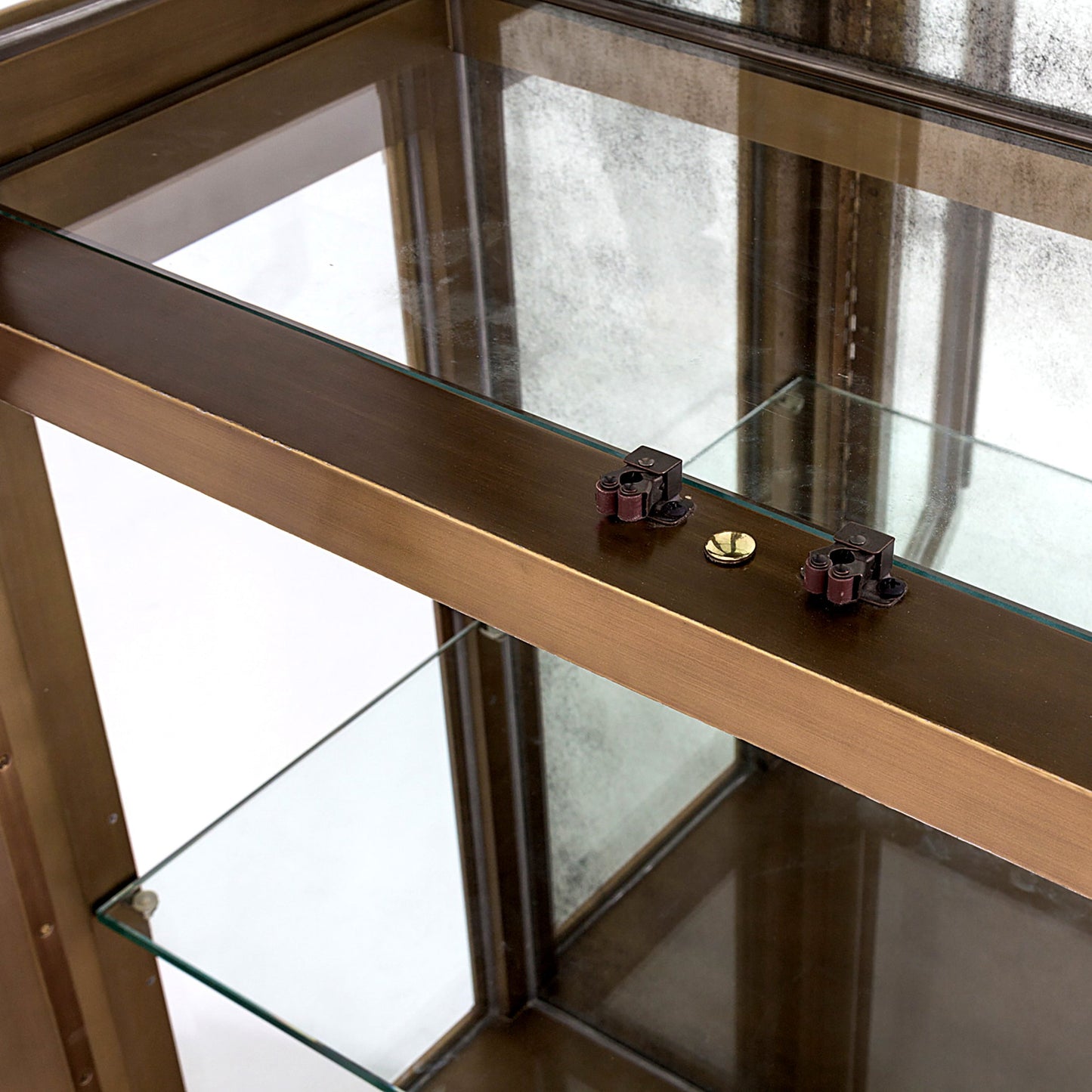 003 SR-700725 | Closeup | Apothecary Vitrine by Global Views in dark brass. Made from poplar, beveled clear glass in a transitional style.