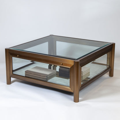 Apothecary Cocktail Table by Global Views in dark brass. Made from poplar, beveled glass in a transitional style.