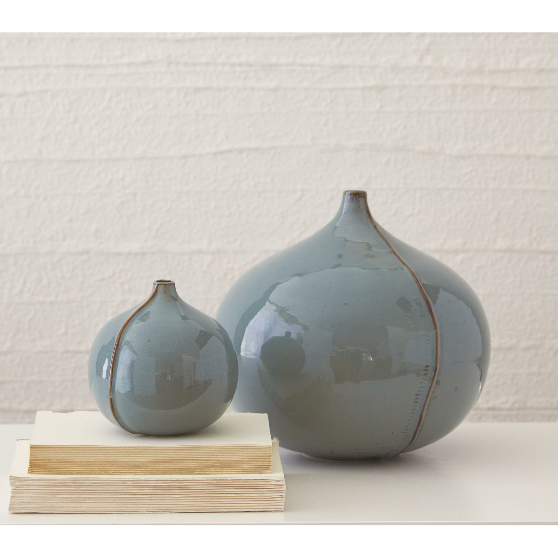 Milo Vase by Global Views in blue. Made from ceramic in a eclectic & global style.
