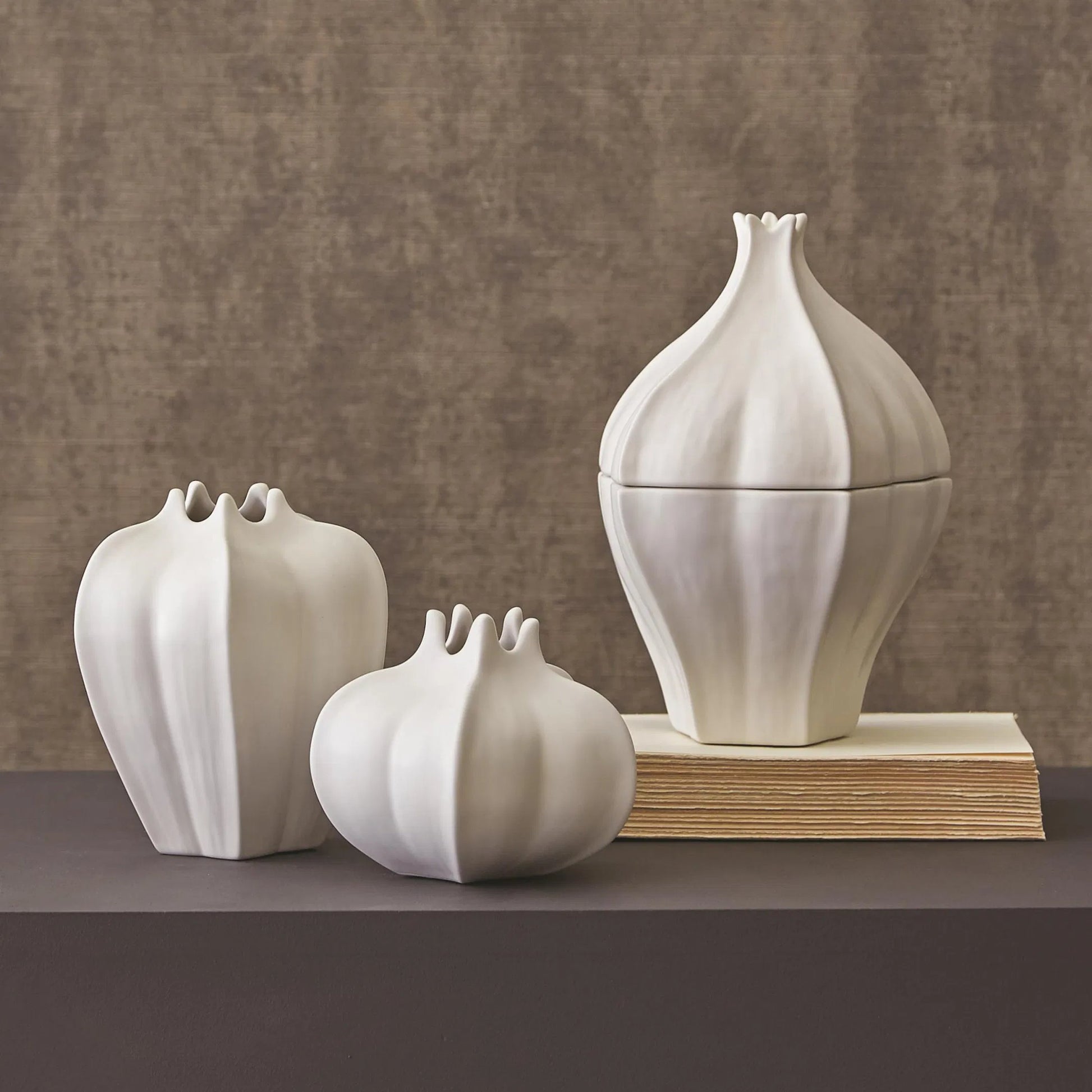 Star Fruit Vase by Global Views. Made from ceramic in a coastal style.