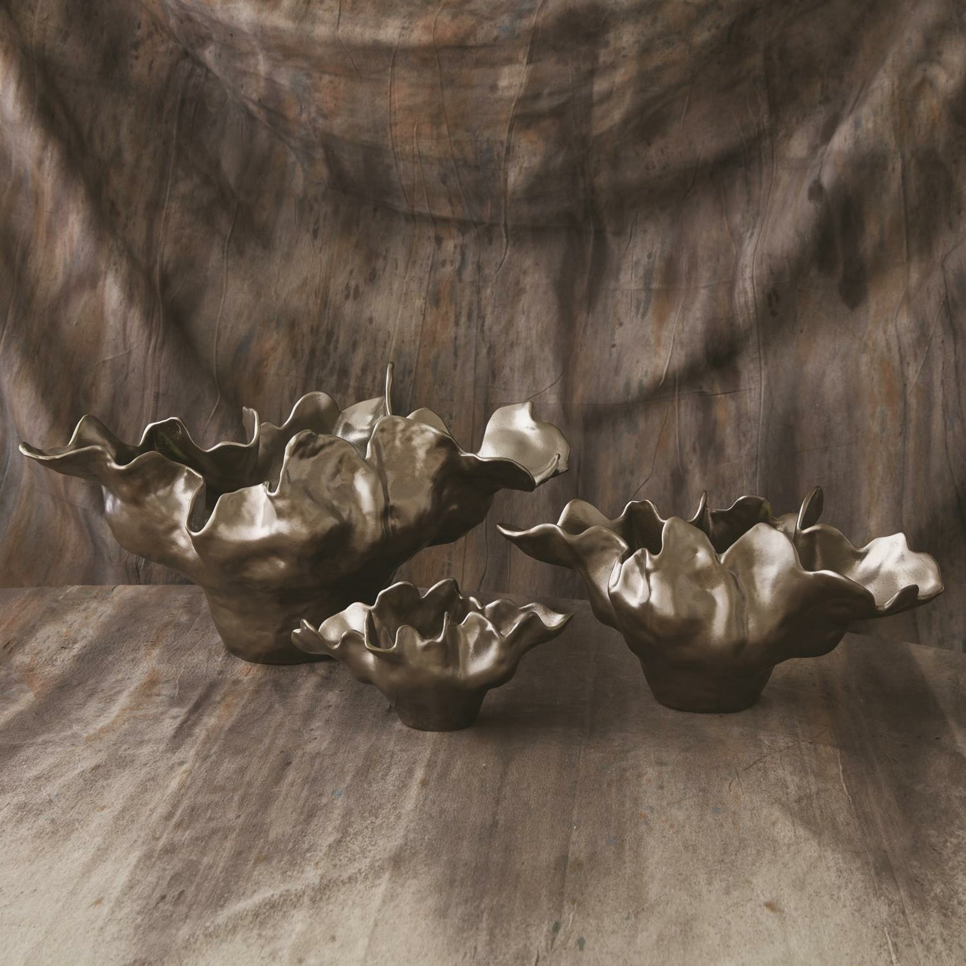 Meteor Bowl by Global Views. Made from ceramic in a coastal style.