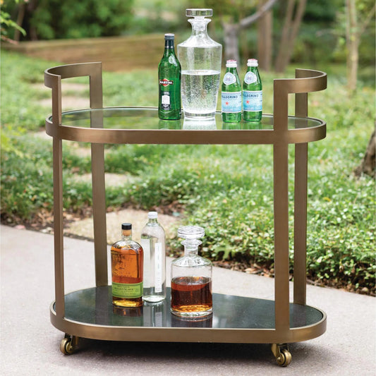 Regan Bar by Global Views. Made from iron, tempered glass, granite in a transitional style.