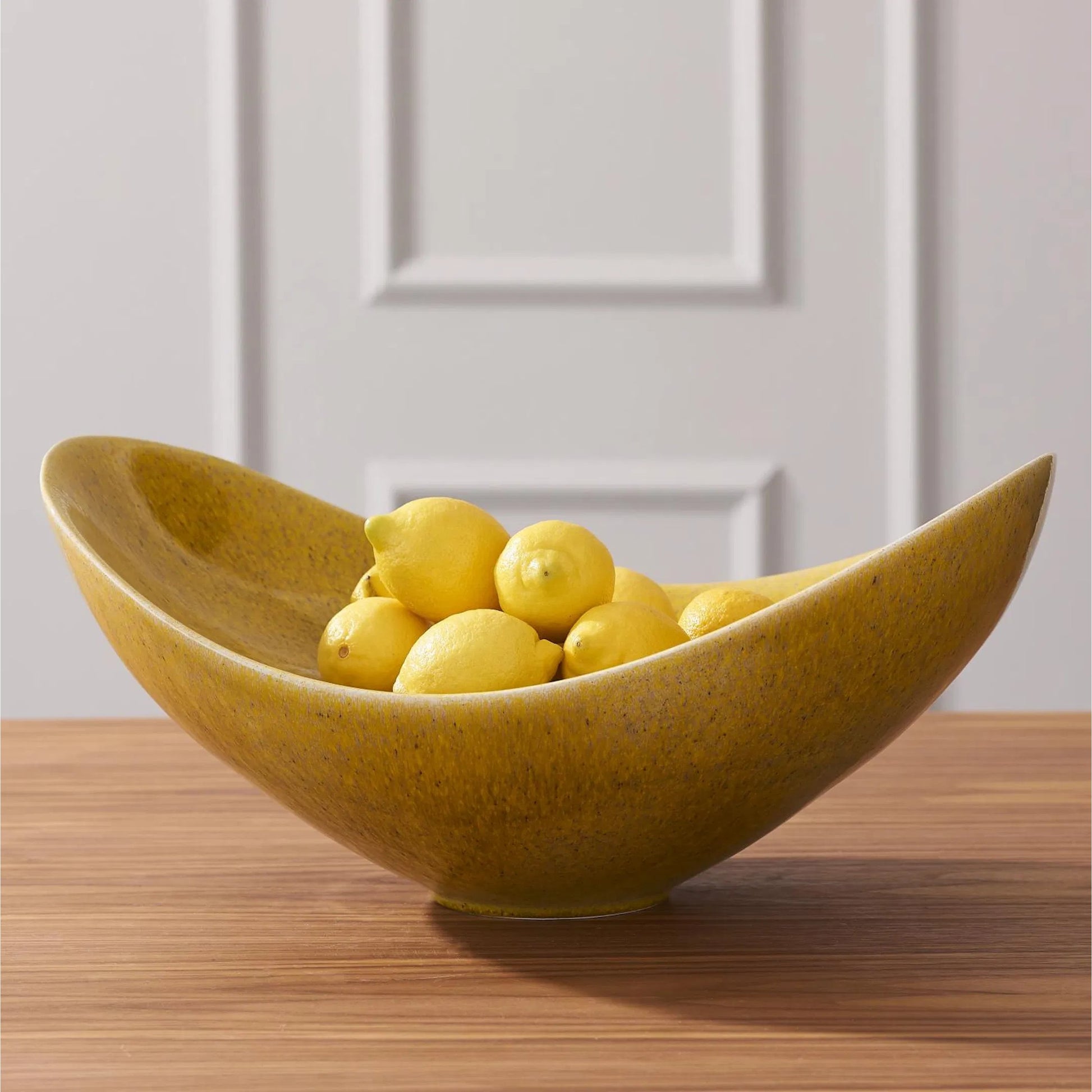 Swoop Bowl by Global Views. Made from ceramic in a modern style.