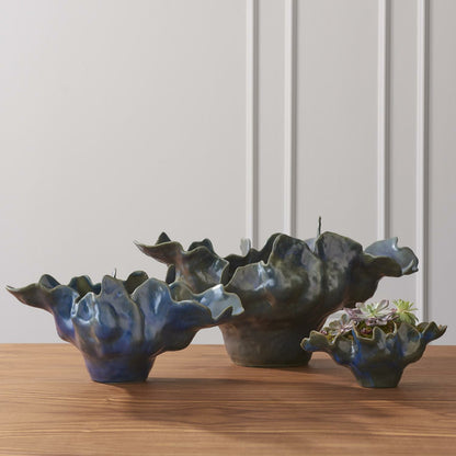 Meteor Bowl by Global Views. Made from ceramic in a coastal style.
