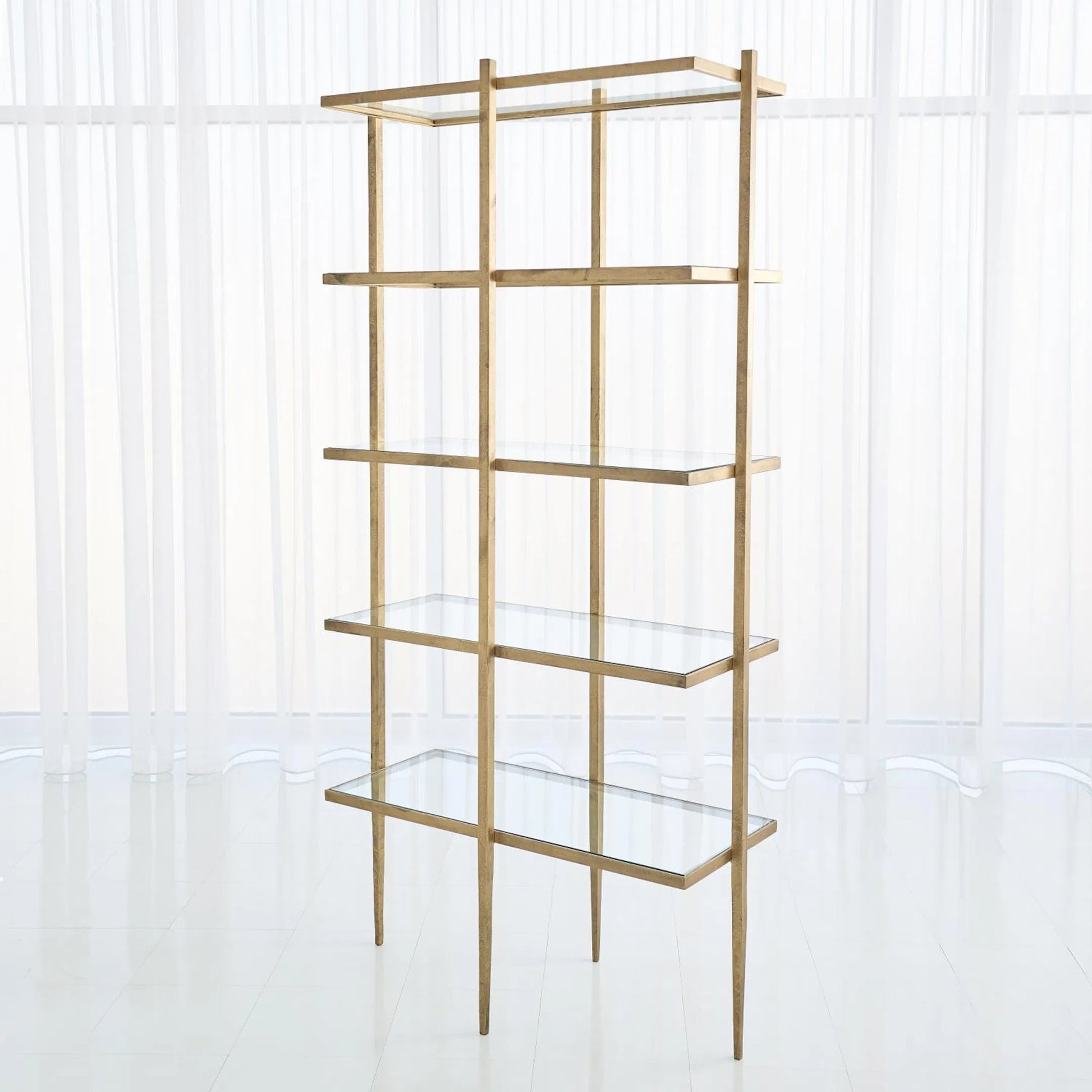 Laforge Etagere by Global Views in antique gold. Made from iron, tempered glass in a transitional style.