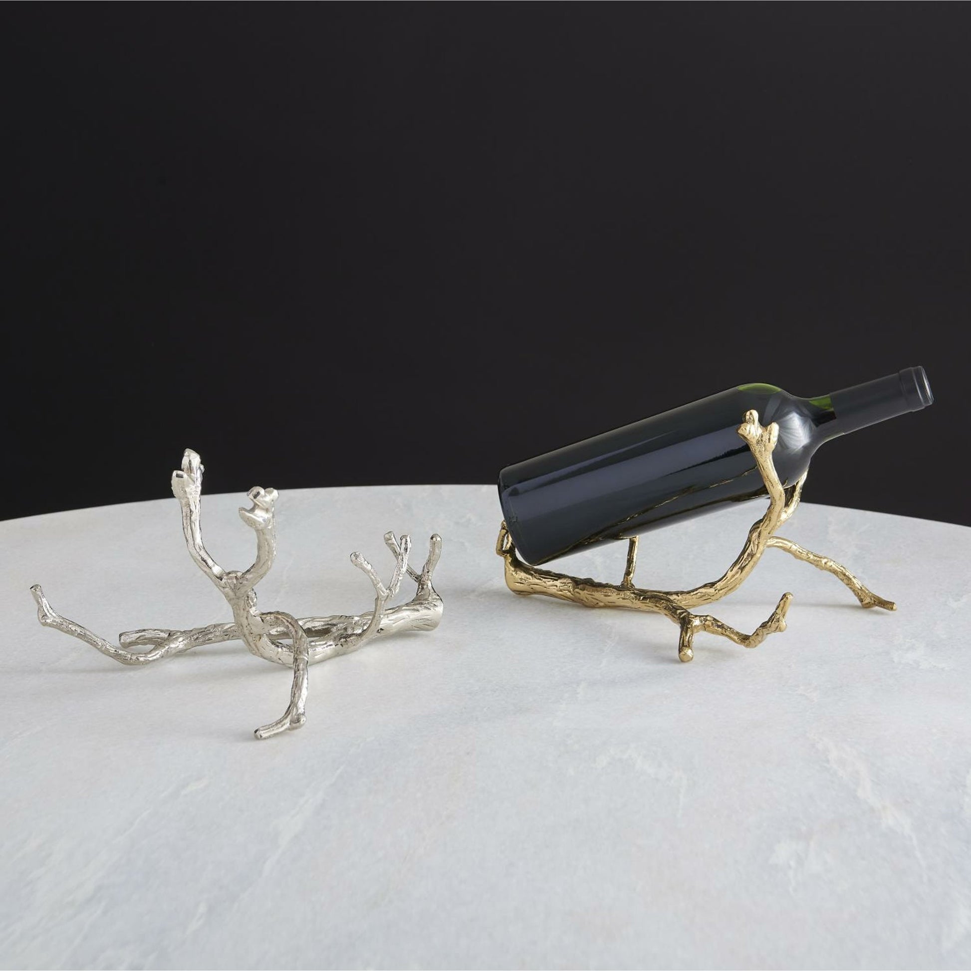 Twig Wine Bottle Holder by Global Views. Made from cast brass in a eclectic & global style.