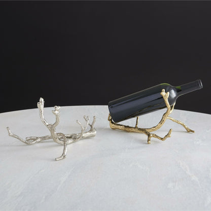 Twig Wine Bottle Holder by Global Views. Made from cast brass in a eclectic & global style.