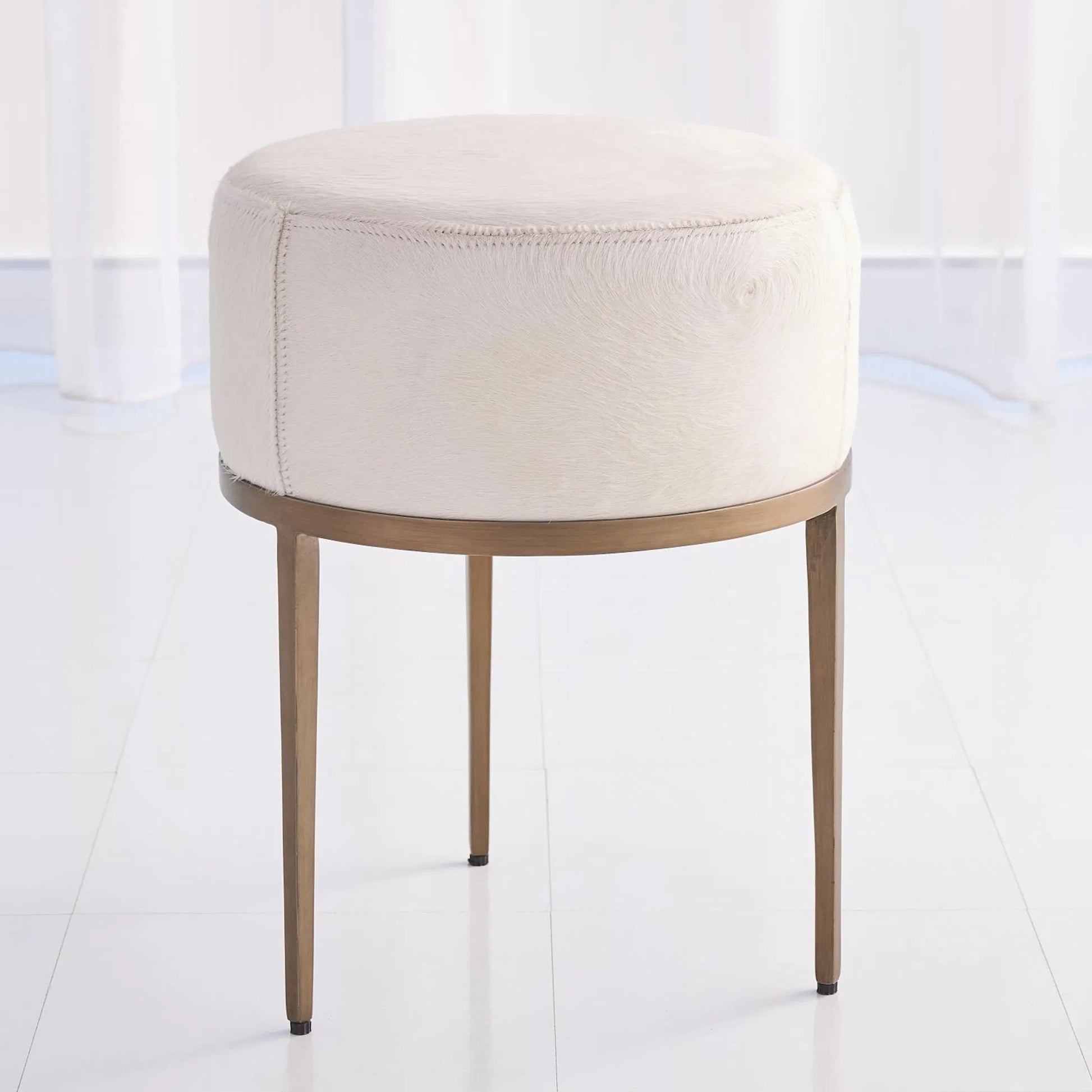 Urban Stool with Hair-On-Hide by Global Views. Made from mango, plyboard, iron in a transitional style.