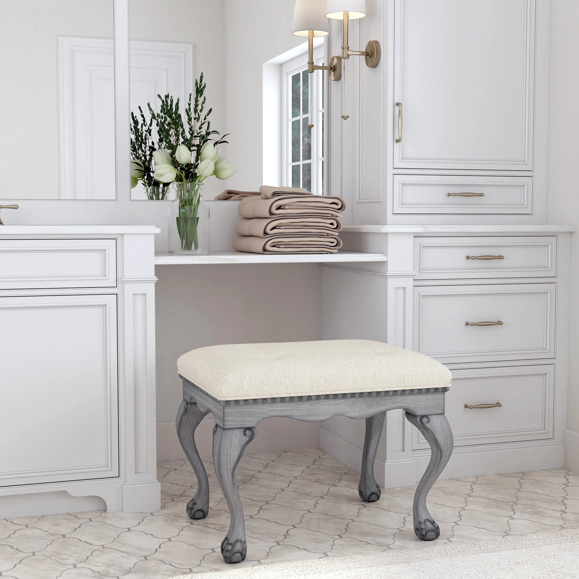 Ashford Upholstered Vanity Stool by Butler Specialty Company in ivory and powder gray. Made from rubberwood solids, mdf, resin, urethane foam, cotton in a traditional style.