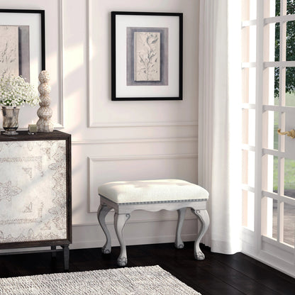 Ashford Upholstered Vanity Stool by Butler Specialty Company in ivory and powder gray. Made from rubberwood solids, mdf, resin, urethane foam, cotton in a traditional style.