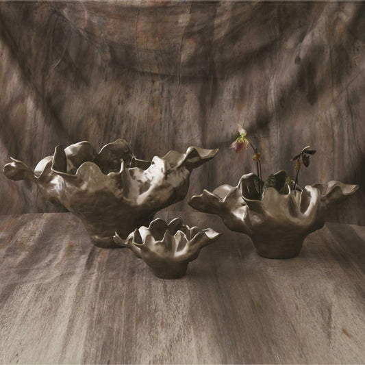 Meteor Bowl by Global Views. Made from ceramic in a coastal style.