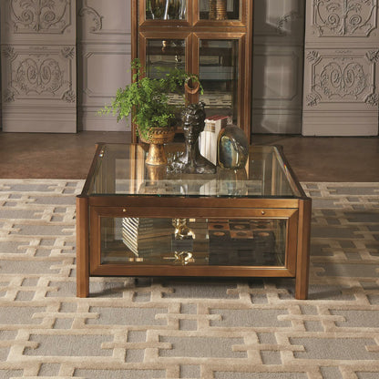 Apothecary Cocktail Table by Global Views in dark brass. Made from poplar, beveled glass in a transitional style.