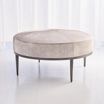Urban Ottoman with Hair-On-Hide by Global Views. Made from mango, plyboard, iron in a transitional style.