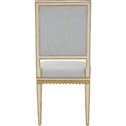 Ines Chair by Currey and Company in mixology moonstone and ivory, antique gold. Made from mahogany in a transitional style.