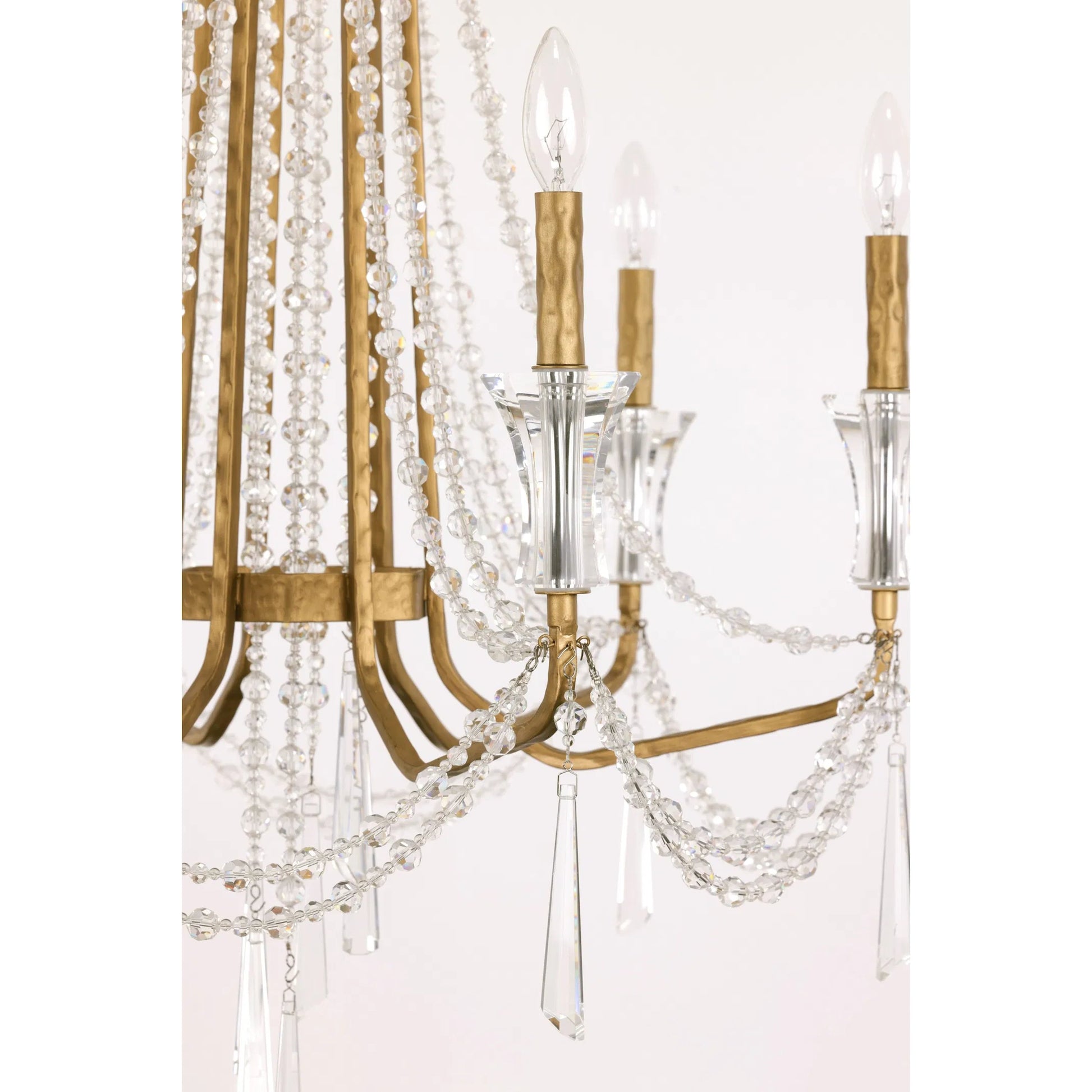 Barcelona 6 Light Chandelier by Varaluz in gold, brass. Made from steel, crystal in a unique style.
