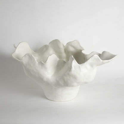 Meteor Bowl by Global Views. Made from ceramic in a coastal style.