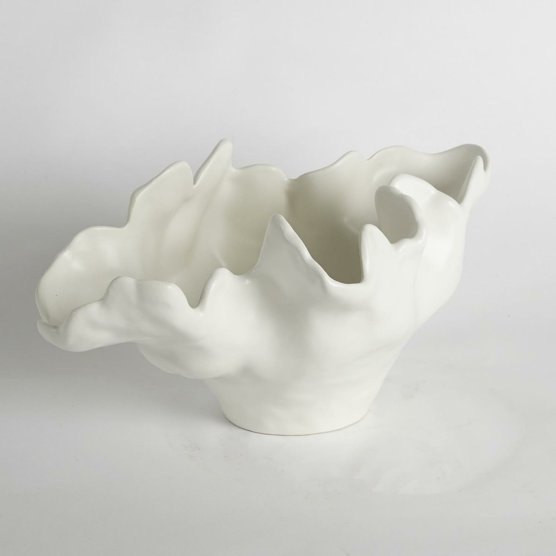Meteor Bowl by Global Views. Made from ceramic in a coastal style.