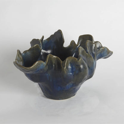 Meteor Bowl by Global Views. Made from ceramic in a coastal style.