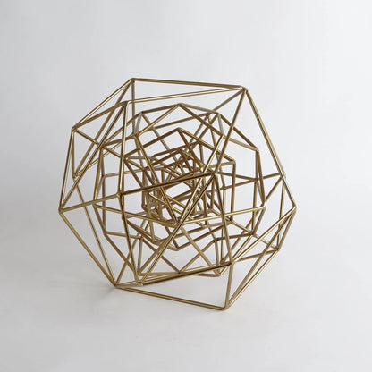 Geo Sculpture by Global Views in gold. Made from iron in a modern style.
