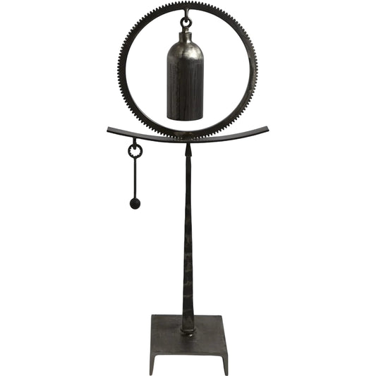 Taper Spring Sound Sculpture by Global Views. Made from iron in a rustic style.