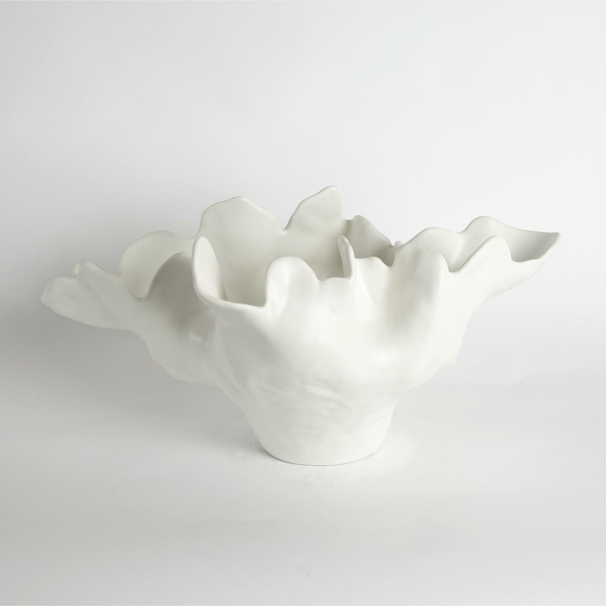 Meteor Bowl by Global Views. Made from ceramic in a coastal style.
