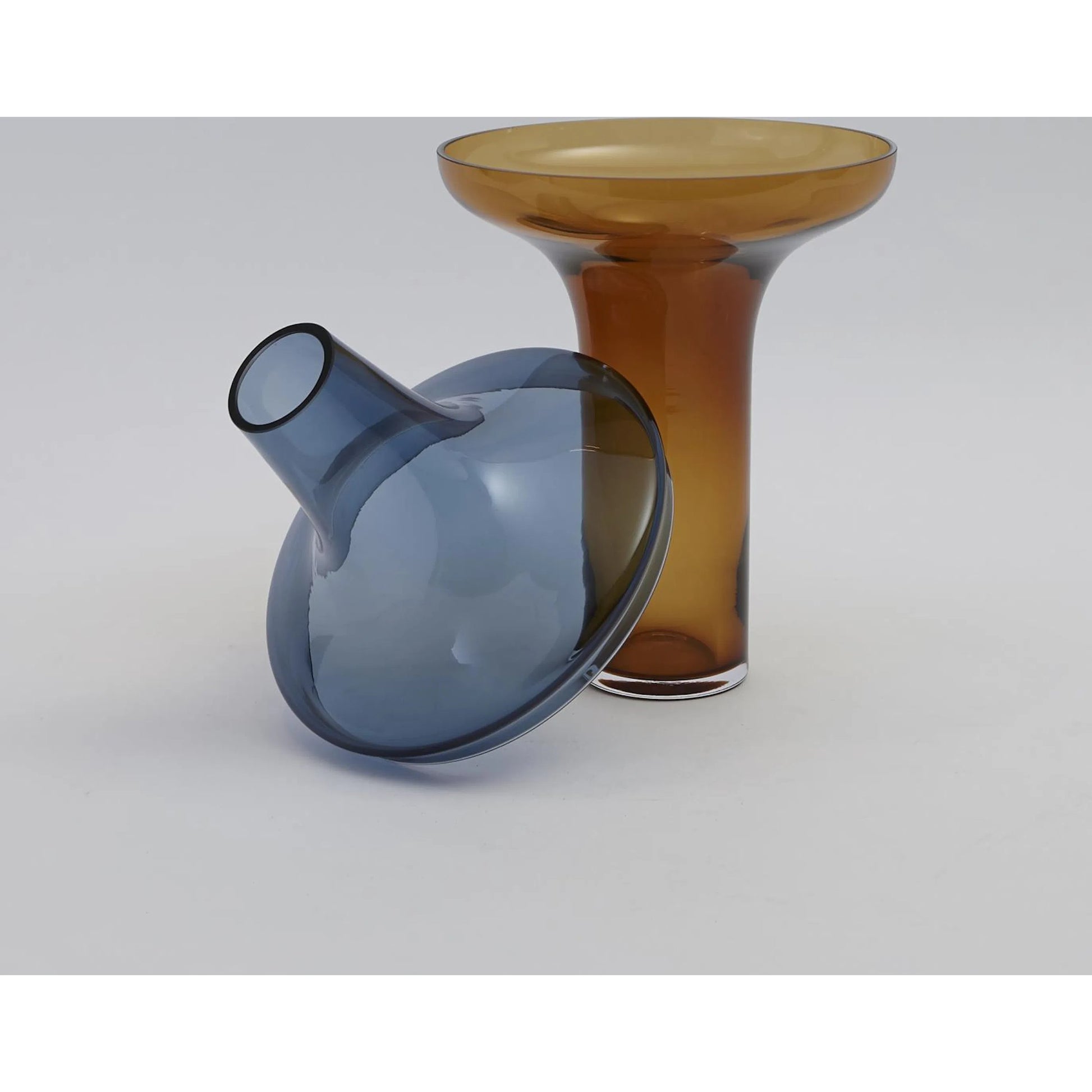 Over Cobalt Vase by Global Views. Made from art glass in a modern style.
