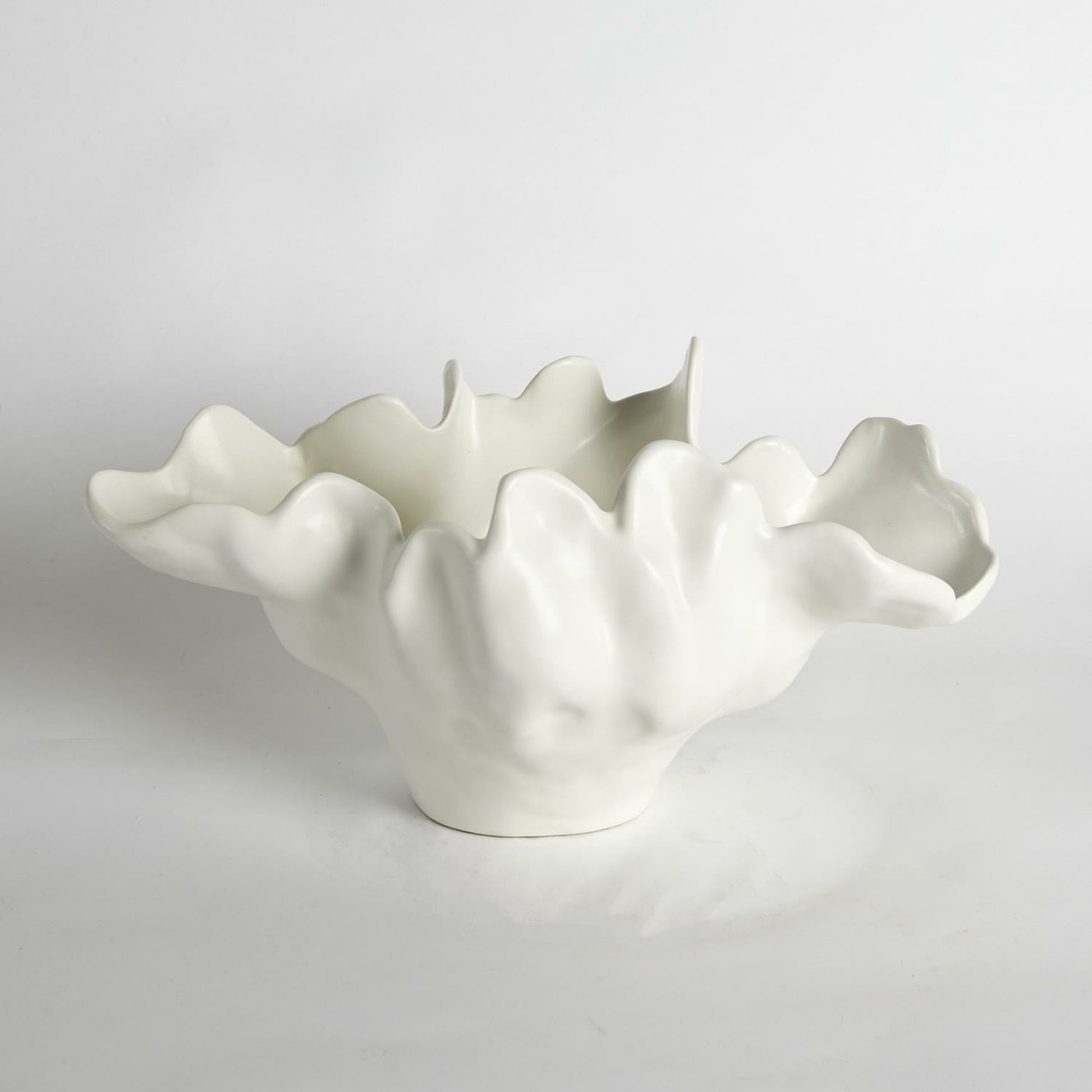 Meteor Bowl by Global Views. Made from ceramic in a coastal style.