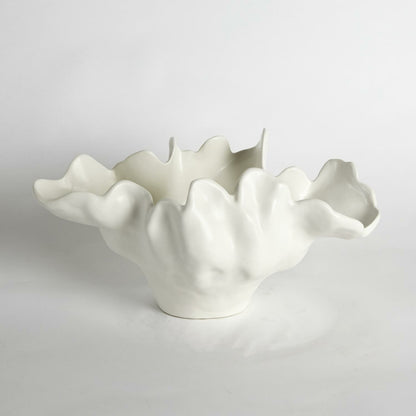 Meteor Bowl by Global Views. Made from ceramic in a coastal style.