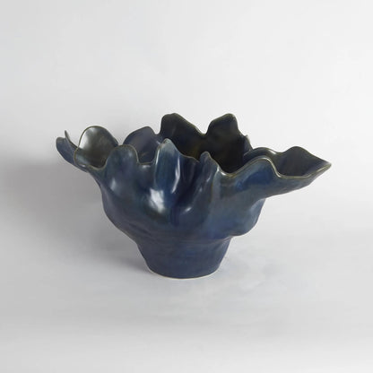 Meteor Bowl by Global Views. Made from ceramic in a coastal style.