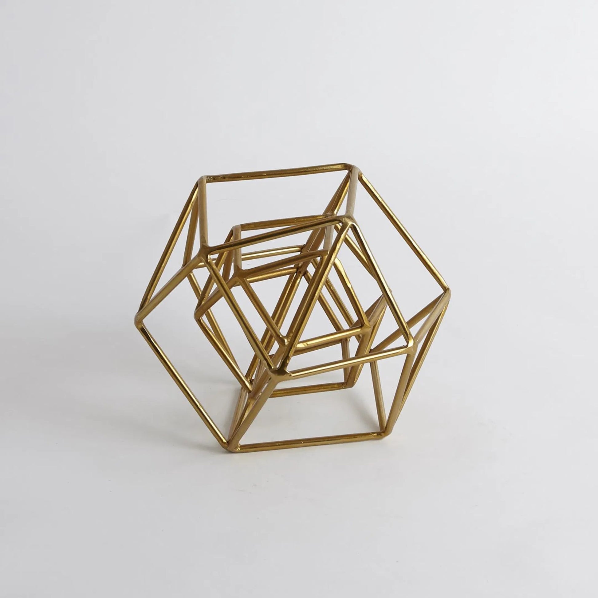Geo Sculpture by Global Views in gold. Made from iron in a modern style.