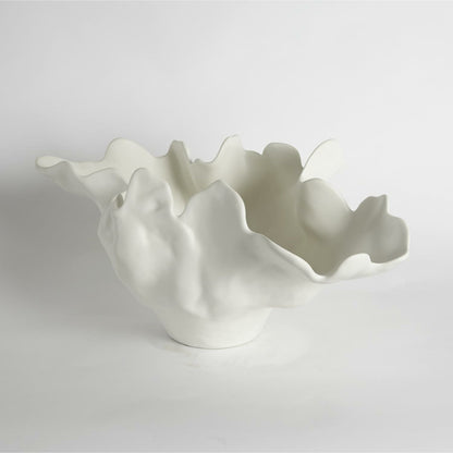 Meteor Bowl by Global Views. Made from ceramic in a coastal style.