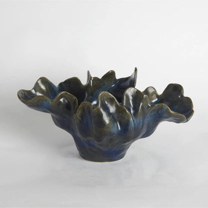 Meteor Bowl by Global Views. Made from ceramic in a coastal style.