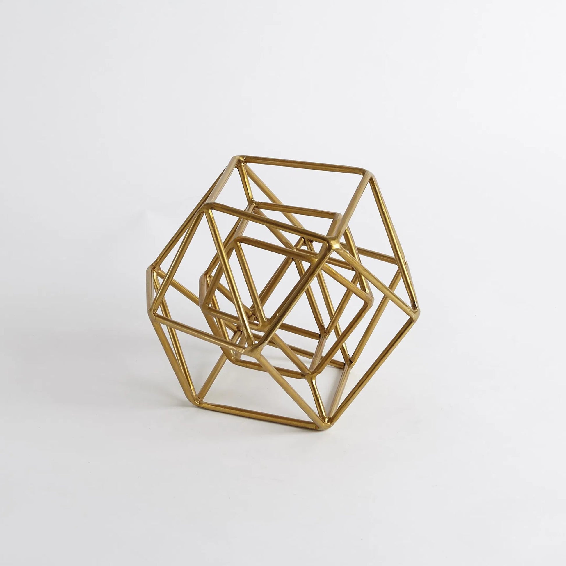 Geo Sculpture by Global Views in gold. Made from iron in a modern style.