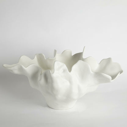 Meteor Bowl by Global Views. Made from ceramic in a coastal style.