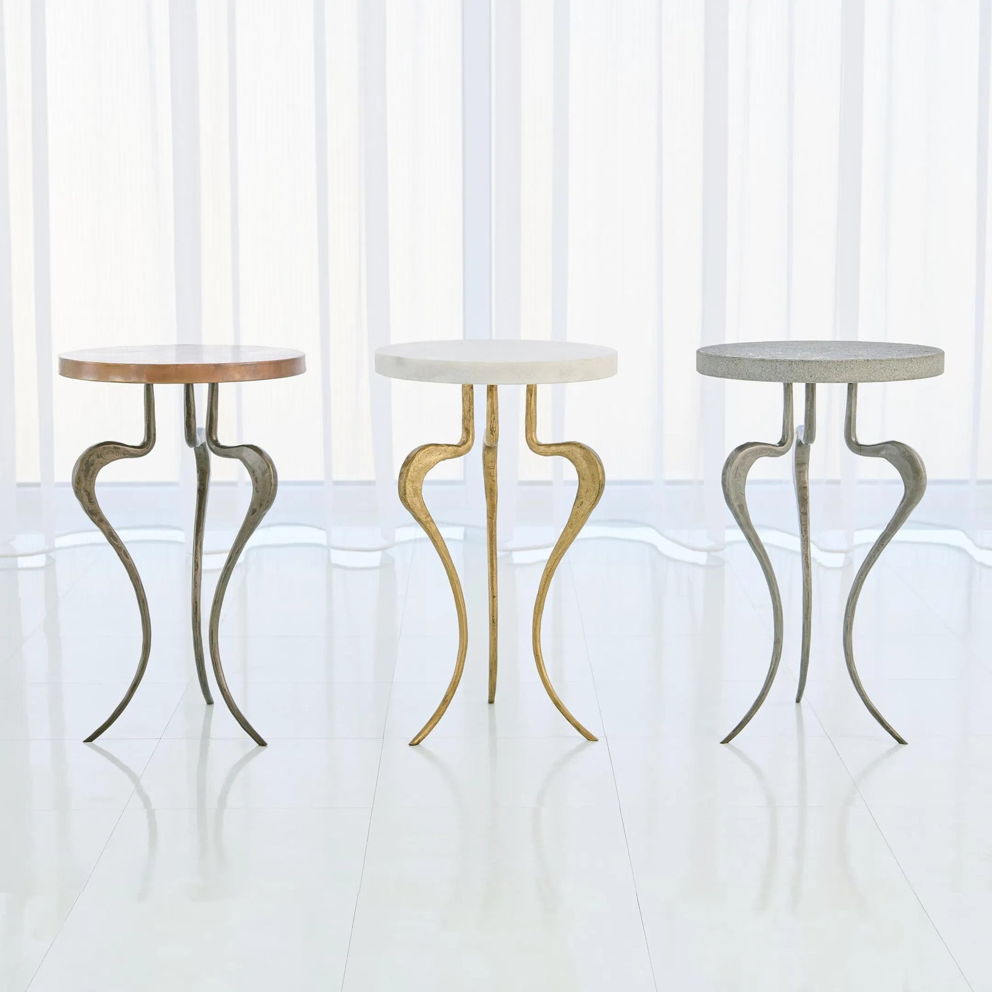 Silhouette Accent Table by Global Views in antique gold. Made from iron, white honed marble in a eclectic & global style.