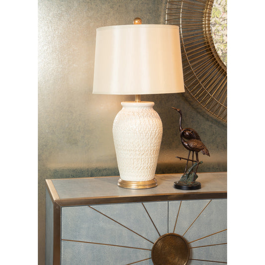 Lucia Lamp by Wildwood in art glaze, antique gold. Made from ceramic, porcelain in a transitional style.
