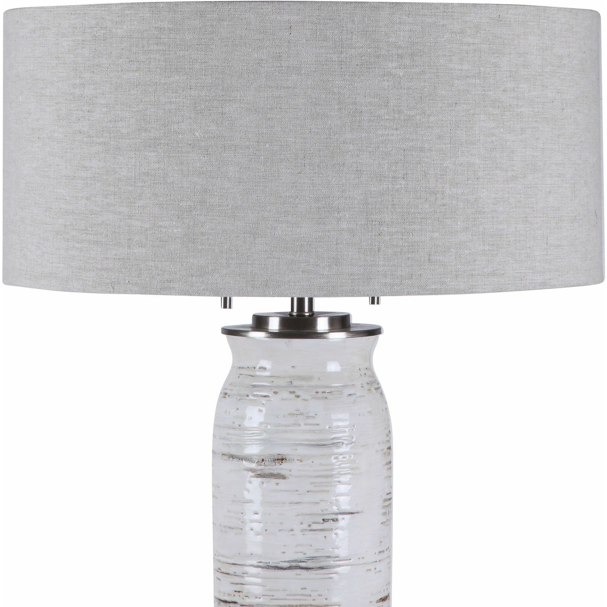 Lenta Table Lamp by Uttermost in white. Made from ceramic, iron, crystal in a transitional style.