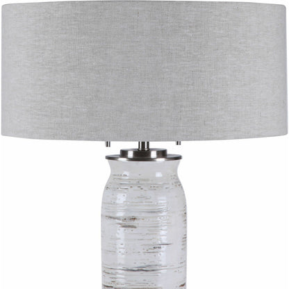 Lenta Table Lamp by Uttermost in white. Made from ceramic, iron, crystal in a transitional style.