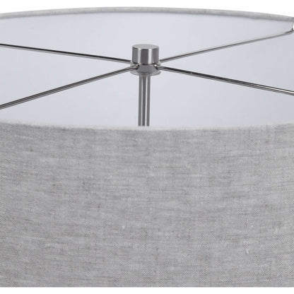 Lenta Table Lamp by Uttermost in white. Made from ceramic, iron, crystal in a transitional style.