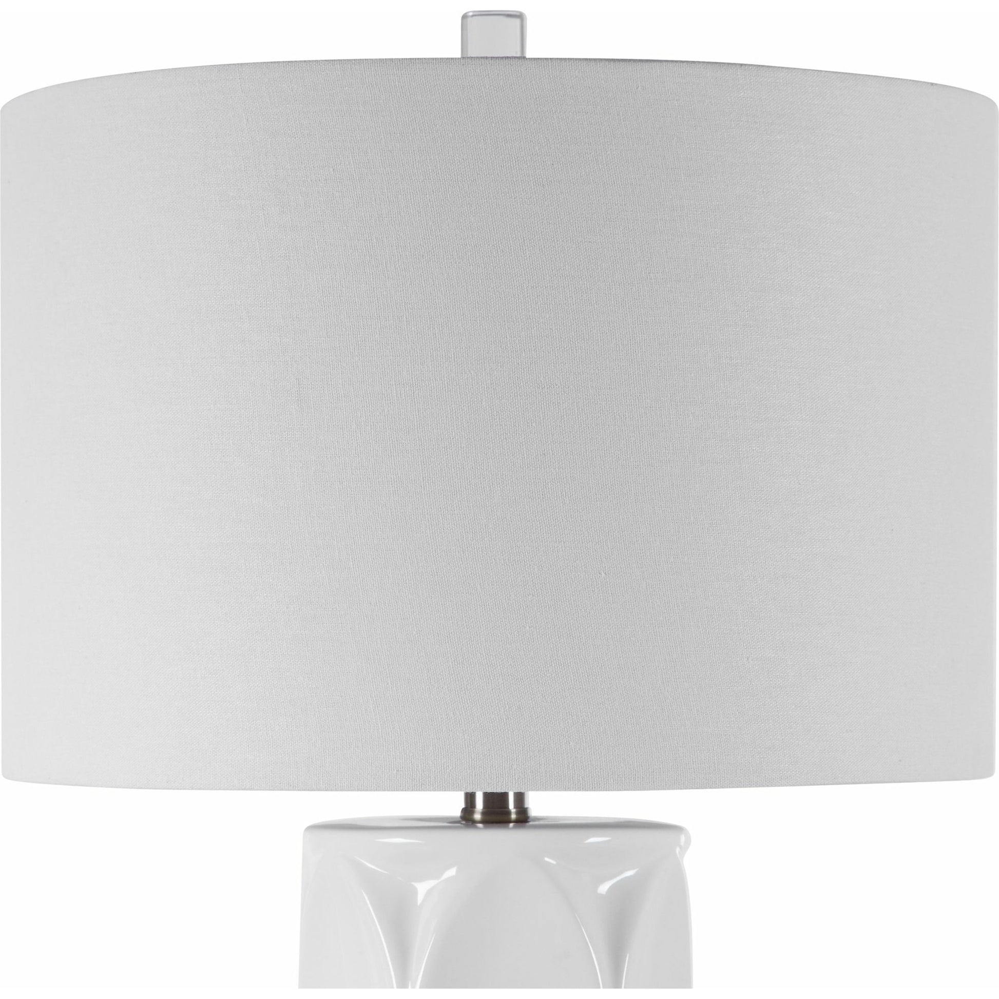 Sinclair Table Lamp by Uttermost in white. Made from ceramic, metal, fabric in a modern style.