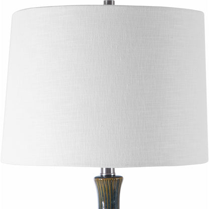 Eichler Mid-Century Table Lamp by Uttermost. Made from ceramic, fabric, iron in a coastal style.