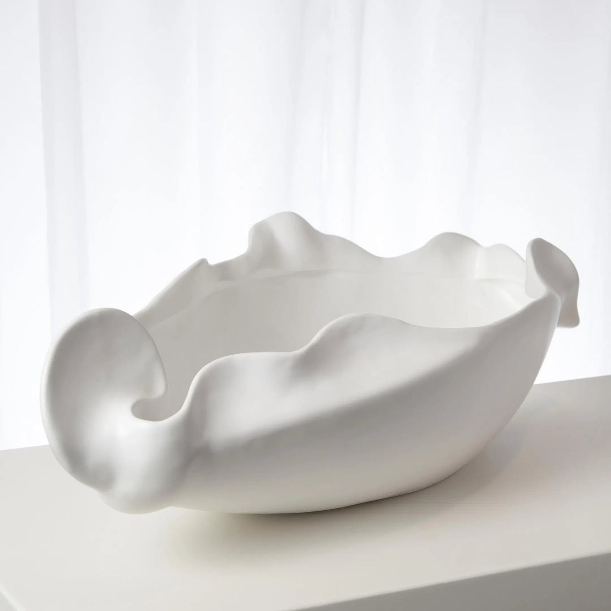Free Form Organic Bowl by Global Views. Made from ceramic in a modern style.
