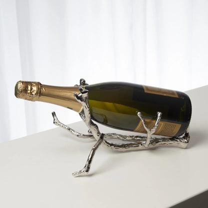 Twig Wine Bottle Holder by Global Views. Made from cast brass in a eclectic & global style.