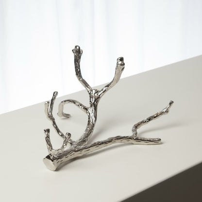 Twig Wine Bottle Holder by Global Views. Made from cast brass in a eclectic & global style.