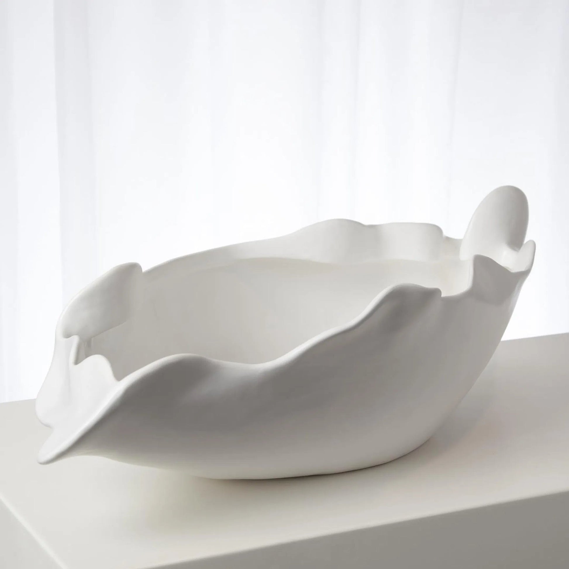 Free Form Organic Bowl by Global Views. Made from ceramic in a modern style.